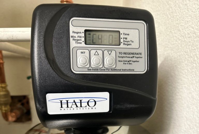 Close-up of a Halo water softener system installed in a home, highlighting water softening technology. Flow Pro Plumbing offers expert plumbing services including water softener installation, repair, and maintenance near me, ensuring high-quality water filtration solutions. Services also include pipe repairs, water heater installation, plumbing upgrades, leak detection, and plumbing maintenance. Trusted plumber near me, water treatment services near me, water softener repair near me, local plumbing expert near me, and affordable plumbing solutions near me. Contact us for plumber near me, plumbing services near me, emergency plumbing services near me, local plumbing expert, plumbing repairs near me, plumbing installation near me, plumbing maintenance services, water heater installation near me, water softener installation near me, drain cleaning near me, pipe repair near me, clogged drain repair near me, leak detection services, sewer line repair near me, plumbing upgrades near me, residential plumbing services, affordable plumbing services near me, plumbing inspection near me, water filtration installation near me, tankless water heater installation near me, burst pipe repair near me, faucet repair near me, toilet repair near me, shower repair near me, drain cleaning services near me, plumbing company near me, licensed plumber near me, licensed plumbing contractors near me, 24/7 plumbing services near me.