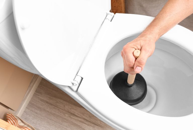 Man using a plunger to unclog a toilet, demonstrating effective DIY methods for clearing clogs. Flow Pro Plumbing offers expert toilet repair, drain cleaning, and plumbing services in Brentwood, Antioch, Oakley, and nearby areas to resolve stubborn clogs and plumbing issues. Call today for professional help with how to unclog a toilet, best way to unclog a toilet, unclog a toilet fast, professional toilet unclogging services, toilet clog removal near me, DIY toilet unclogging tips, toilet plunger techniques, fix a clogged toilet, clogged toilet repair near me, expert toilet repair in Brentwood, affordable toilet repair in Antioch, Oakley toilet unclogging services, how to fix a slow-draining toilet, emergency toilet repair near me, plumbing services for clogged toilets, best plumber for toilet repair in Concord, toilet drain cleaning in Walnut Creek, how to clear a toilet blockage, Pleasant Hill plumbing services for toilets, remove toilet clog with plunger, when to call a plumber for a clogged toilet, Discovery Bay toilet repair experts, how to unclog a toilet without a plunger, quick toilet unclogging methods, toilet repair services near me, Brentwood professional plumbing for clogged toilets, Bay Point toilet drain solutions, reliable toilet repair in Pittsburg, Knightsen toilet unclogging service, Clayton toilet drain cleaning experts, eco-friendly toilet clog solutions, how to prevent toilet clogs.