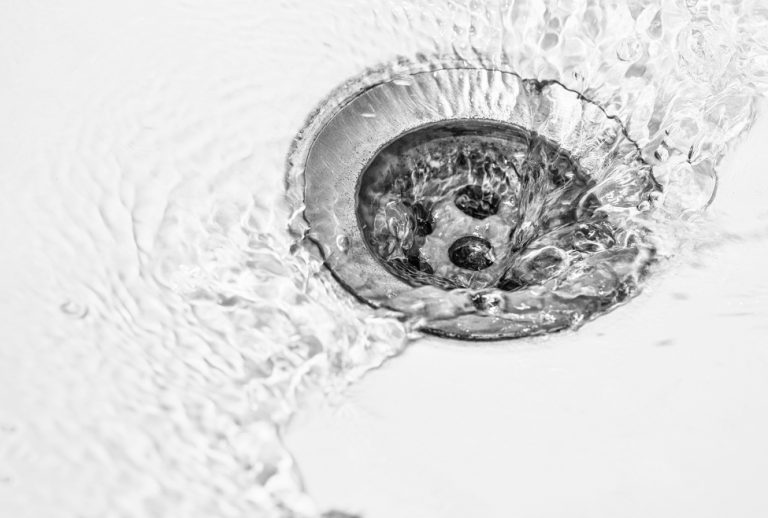 Water draining down a sink drain, preventing drain flies with professional drain cleaning and clog removal by Flow Pro Plumbing in Brentwood, Antioch, Oakley, Concord, Pittsburg, and Walnut Creek. Call us today for help with how to get rid of drain flies, eliminate drain flies naturally, drain fly removal, stop drain fly infestation, prevent drain flies, professional drain cleaning, drain cleaning near me, clogged drain solutions, drain fly treatment, best way to remove drain flies, plumbing services near me, local plumber for drain cleaning, hydro jetting for drains, clogged drain plumber, expert drain cleaning services, drain fly extermination, sewer line cleaning, drain maintenance, Flow Pro Plumbing services, Antioch drain cleaning, Brentwood plumber, Oakley sewer cleaning, Concord drain repair, Pittsburg hydro jetting, Walnut Creek plumbing repair.