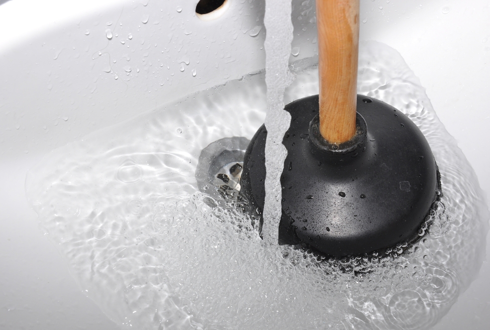 Home Plumber using a plunger on a clogged sink for drain cleaning, showing the best drain clog remover solutions. Flow Pro Plumbing offers professional drain cleaning services to clear tough clogs efficiently. Call us today for help with best drain clog remover, how to unclog a drain, best drain cleaner for clogs, professional drain cleaning, clogged sink solutions, plumber for drain cleaning near me, hydro jetting services, sewer line clog removal, safe drain unclogging methods, drain cleaning services near me, best liquid drain cleaner, how to dissolve tough clogs, emergency drain cleaning, slow-draining sink fix, best way to clear a blocked drain, drain repair services, local plumber for clogged drains, kitchen sink clog removal, bathroom drain cleaning, eco-friendly drain cleaners, clogged drain plumber near me, drain snake services, best drain declogger, hair clog remover for drains, chemical-free drain cleaning, best drain opener for grease, professional pipe unclogging, stubborn drain clog solutions, drain cleaning experts near me, DIY drain unclogging vs. professional services. We provide Drain Cleaning Antioch, Drain Cleaning Bethel Island, Drain Cleaning Brentwood, Drain Cleaning Byron, Drain Cleaning Concord, Drain Cleaning Pleasant Hill, Drain Cleaning Knightsen, Drain Cleaning Oakley, Drain Cleaning Pittsburg, Drain Cleaning Walnut Creek, Drain Cleaning Discovery Bay, Drain Cleaning Bay Point, Drain Cleaning Clayton.
