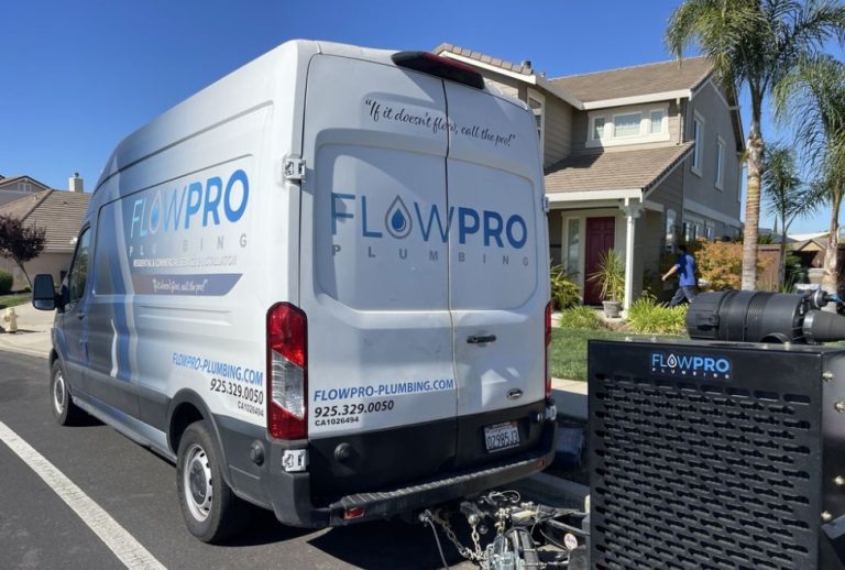 Flow Pro Plumbing branded service vehicle parked outside a residential home in Brentwood, CA, representing affordable plumber hourly rates, drain cleaning services, toilet installation, and professional plumbing repair costs. Call us today for help with plumber hourly rates, how much do plumbers charge per hour, average cost of a plumber near me, emergency plumber hourly rate, affordable plumber services near me, local plumber prices, residential plumbing rates, commercial plumbing rates, plumbing repair cost per hour, Flow Pro Plumbing hourly rates, cost to hire a plumber near me, plumber cost estimate, toilet installation cost, drain cleaning service cost, pipe repair rates, water heater repair hourly rate, faucet replacement cost, plumber call out fee, plumbing services Brentwood CA, Antioch plumber rates, Oakley plumbing cost, Discovery Bay plumbing services, Pittsburg CA plumber near me, Concord CA plumber hourly rate.