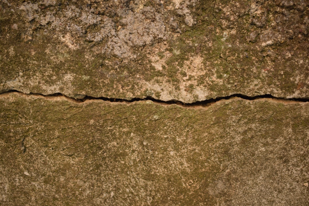 Home slab leak cracked concrete foundation hidden plumbing pipes beneath home - what is a slab leak