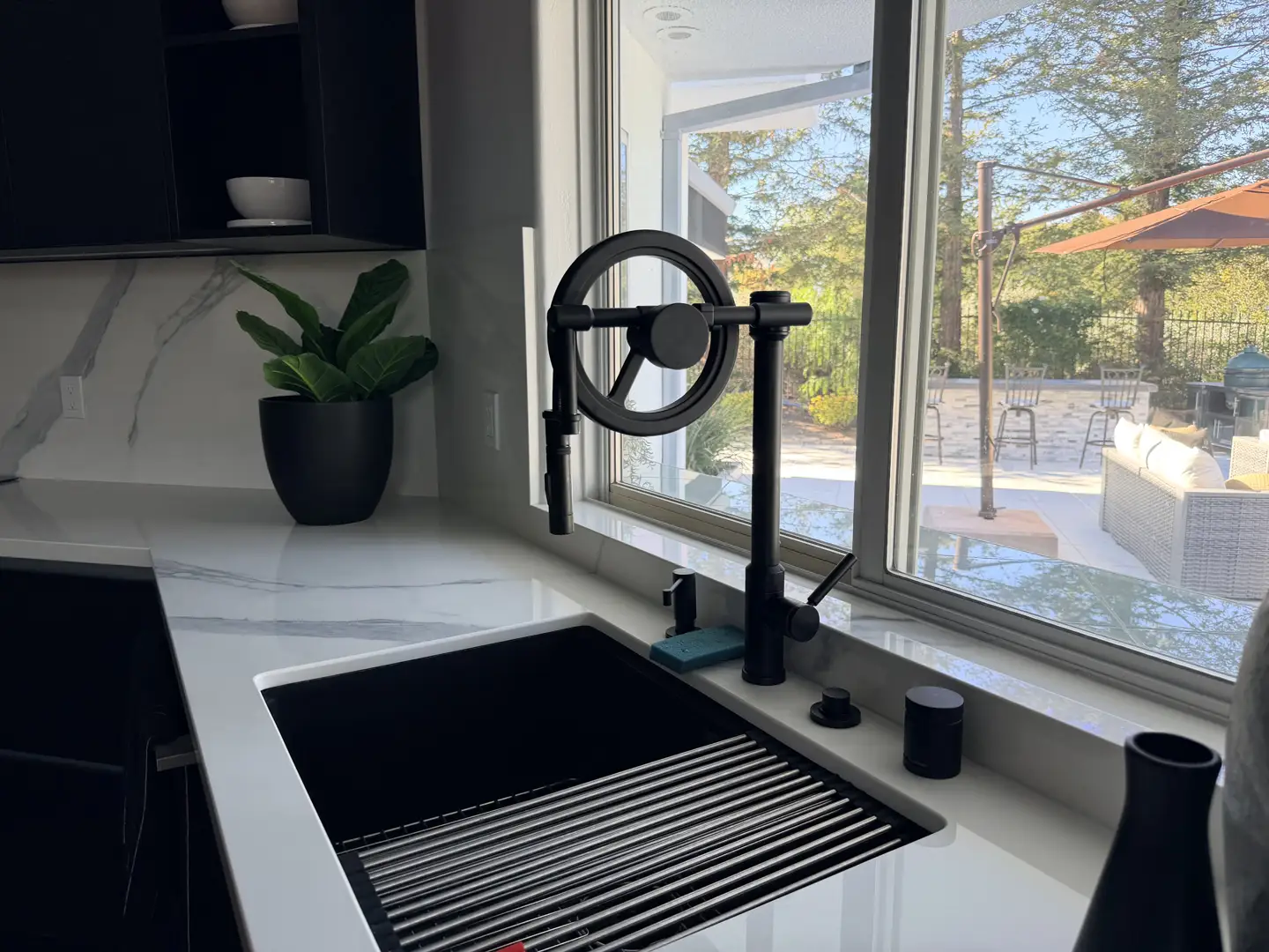 Home modern kitchen sink installation in a clean home kitchen - sink installation
